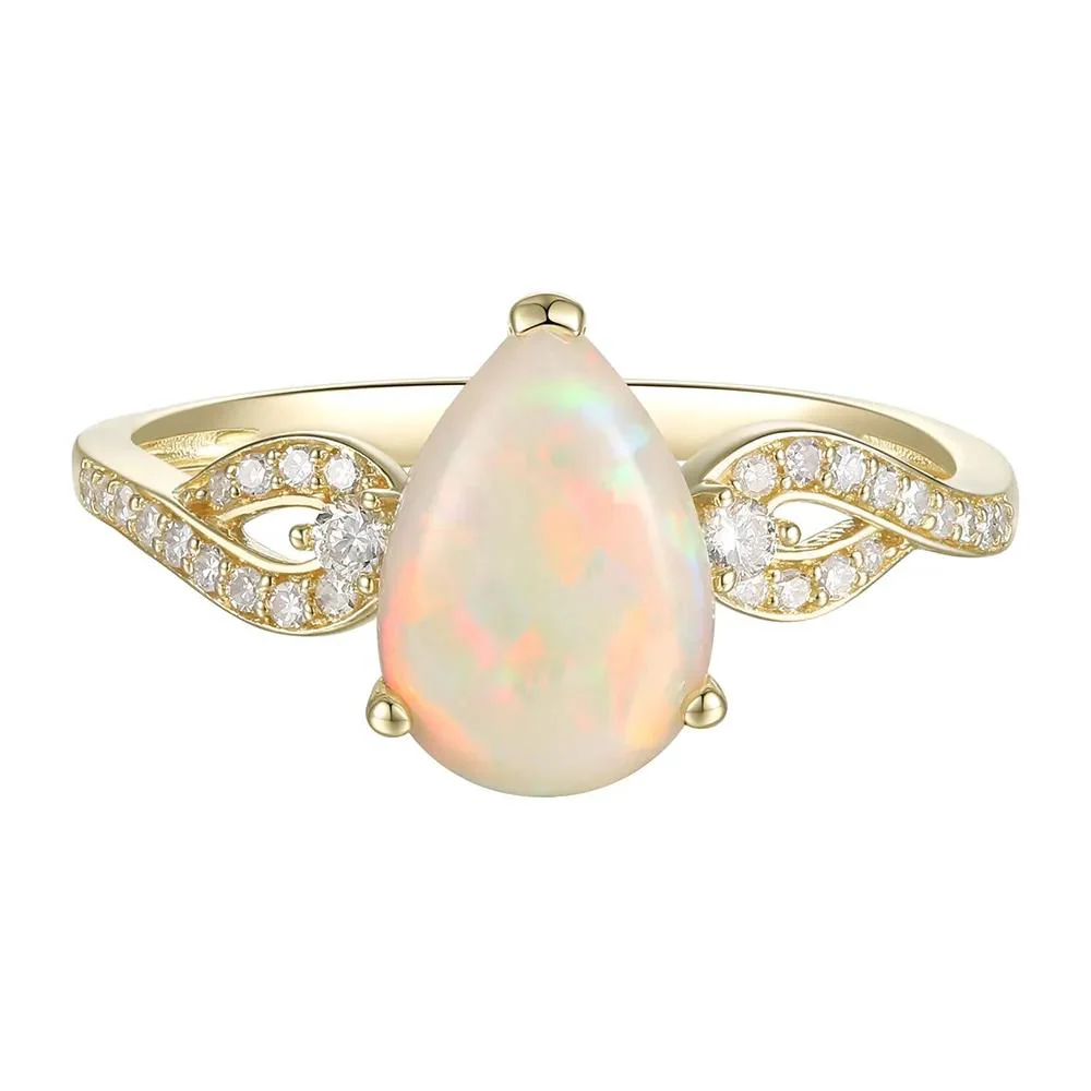 1/7 CT. Tw. Pear-Shaped Opal Ring with Diamonds 10K Yellow Gold Size 7